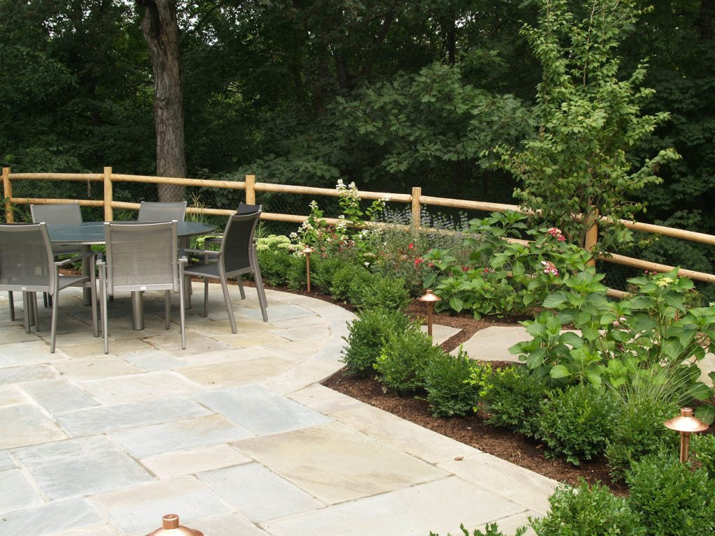 Established shrub plantings with architecture